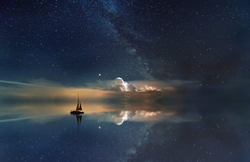 Segelboot unter Sternenhimmel – Vision und Weite